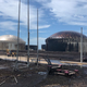 Here, the South Riding Point oil terminal’s on-shore tanks are covered in oil. Oil is also strewn across the soil and pavement of the site.